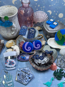 Photograph of acrylic jewellery by The Owl & The Serpent.