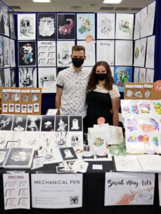 A Photograph of MechanicalPen and Sarah May Arts' table at Supanova 2021 - Gold Coast.